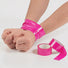 Pink bondage tape wrapped around wrists to demonstrate self-adhesive restraint use, with two rolls of tape displayed beside the bound wrists.