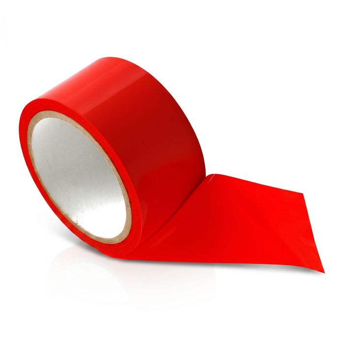 Close-up of a roll of red bondage tape partially unrolled, highlighting the smooth glossy finish and flexible self-adhering material.