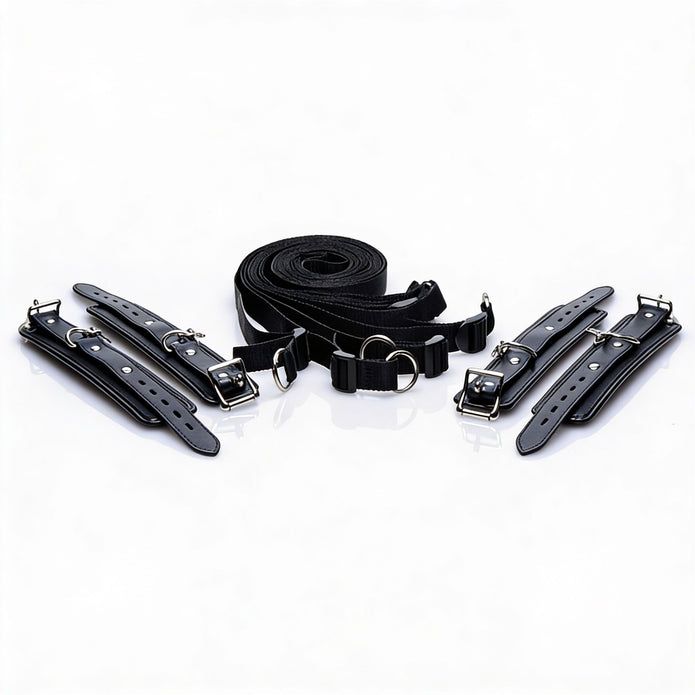 Deluxe bed restraint kit featuring four padded adjustable cuffs, durable connecting straps, quick-release clips, and metal hardware for secure positioning