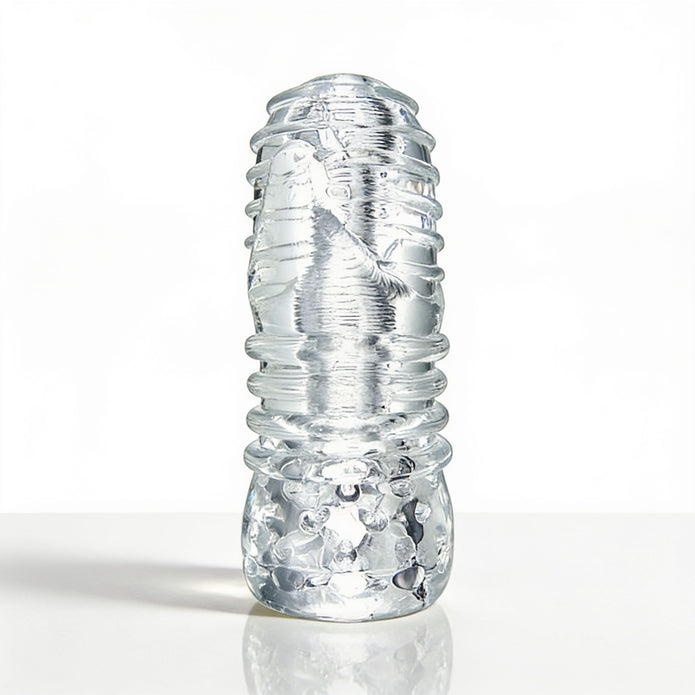 Front-facing view of the Palm-Tec LX20 Intense Stroker featuring a clear ergonomic sleeve with layered external ridges and visible internal texture.