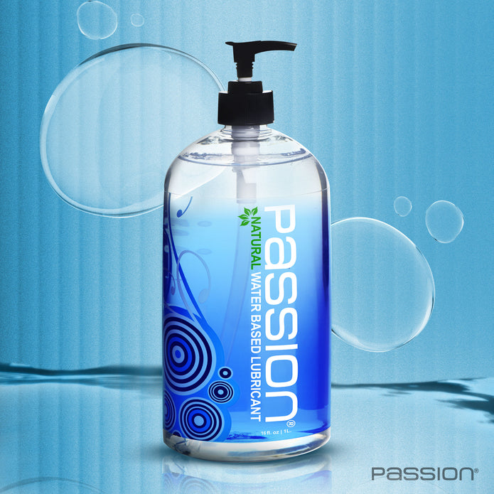 Passion Natural Water Based Lubricant 16 oz pump bottle standing against a blue underwater-inspired background with floating bubbles, emphasizing its water-based formula.