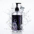Large bottle of Passion Premium Silicone-Based Lubricant with pump dispenser surrounded by dynamic liquid splash effects, highlighting its smooth, long-lasting formula
