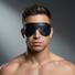 Male model wearing the Strict Leather padded blindfold featuring a soft padded design and secure elastic strap for comfortable sensory play
