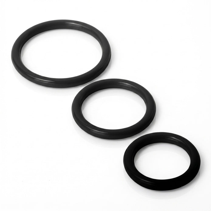 Set of three black silicone cock rings in graduated sizes made from flexible, body-safe silicone for customizable support, comfort, and performance enhancement